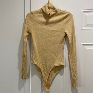 Soft yellow turtleneck free people bodysuit size medium
